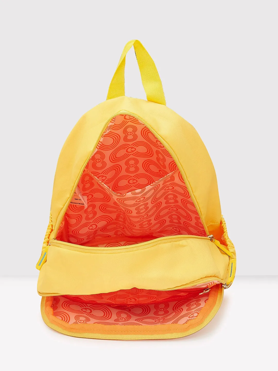 Caprese Xenia Backpack Medium Dual Compartment Yellow Printed