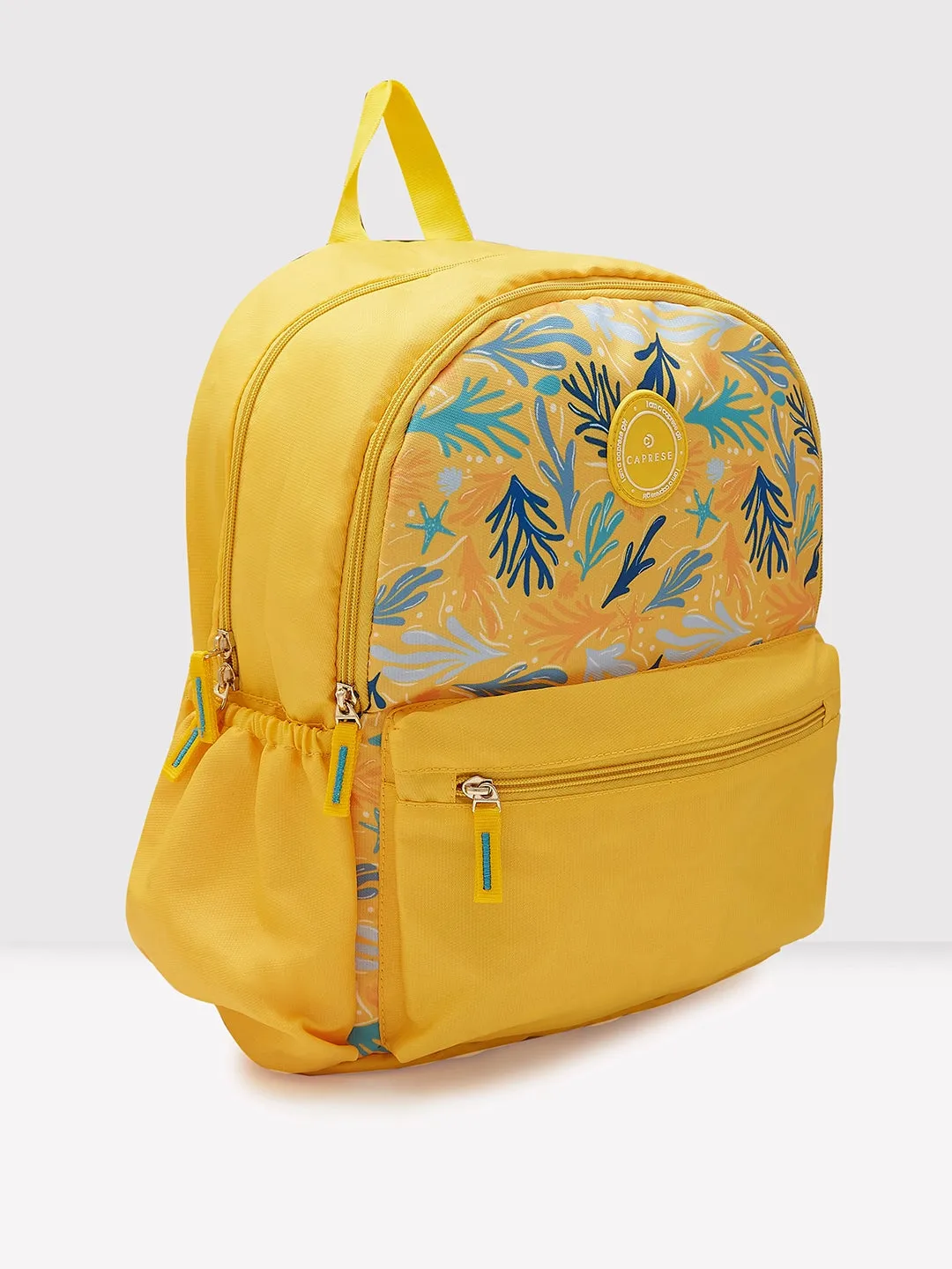 Caprese Xenia Backpack Medium Dual Compartment Yellow Printed